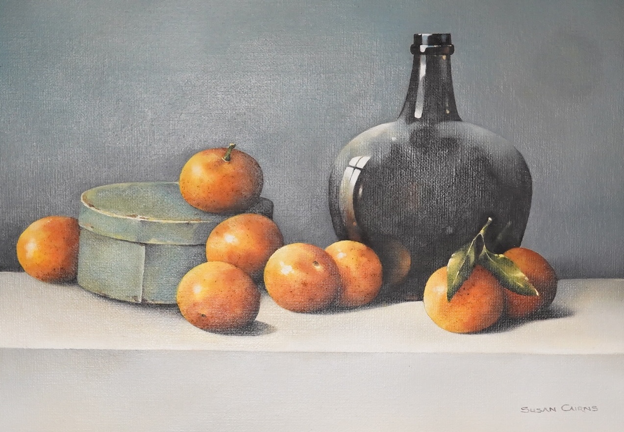 Susan Cairns (Irish), pair of oils on board, Still lifes of fruit and vessels, each signed, 24 x 35cm. Condition - good